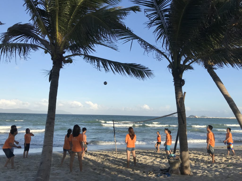 Playing volleyball in the evening