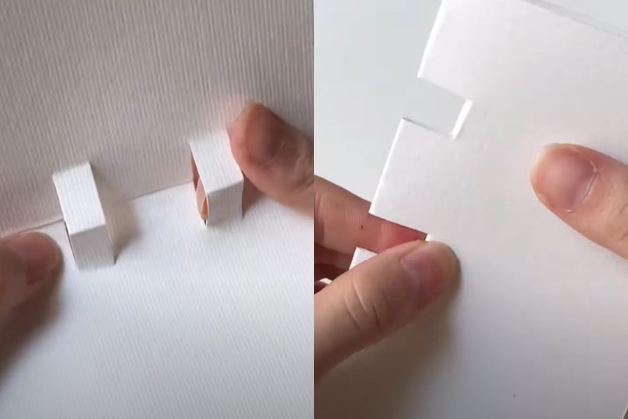 Bẻ ngược phần giấy bị cắt vào trong tấm bìa gập.