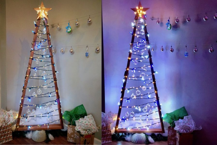 Mẫu trang trí cây thông Noel với khung gỗ và đèn led trái châu nhiều màu sắc.