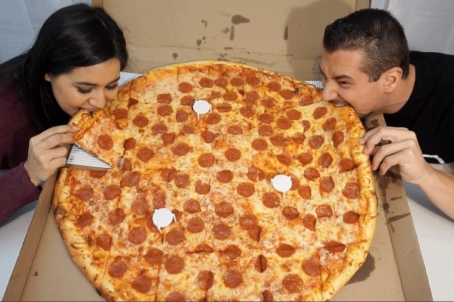 Ăn Pizza quá nhiều có thể dẫn tới thừa cân, béo phì.
