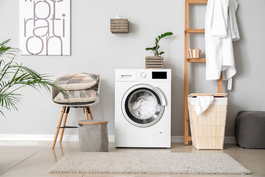 Máy giặt Haier với thiết kế nhỏ gọn, hiện đại.