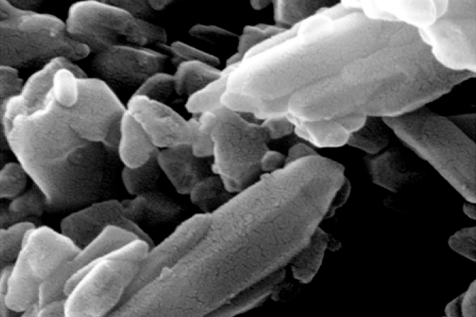 Silica dust under microscope. It is made up of tiny particles of crystalline silica